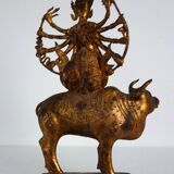 Golden bronze statue of Shiva on Nandi, India, mid-20th century.