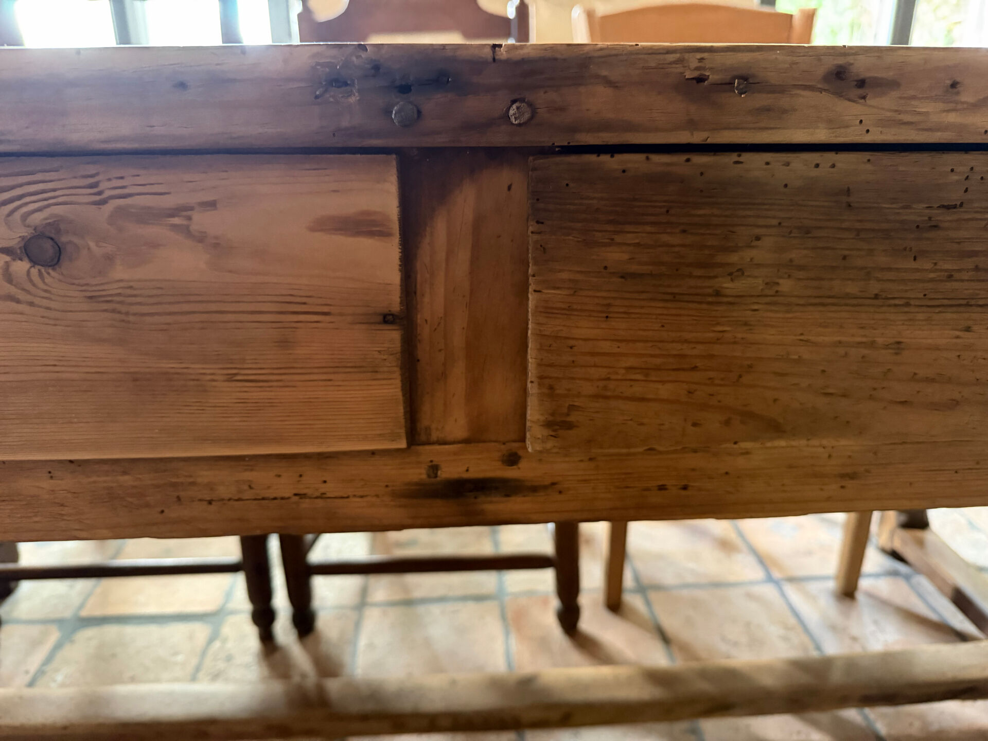 Renovated raw wood farmhouse table