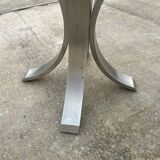 Glass table with iron leg