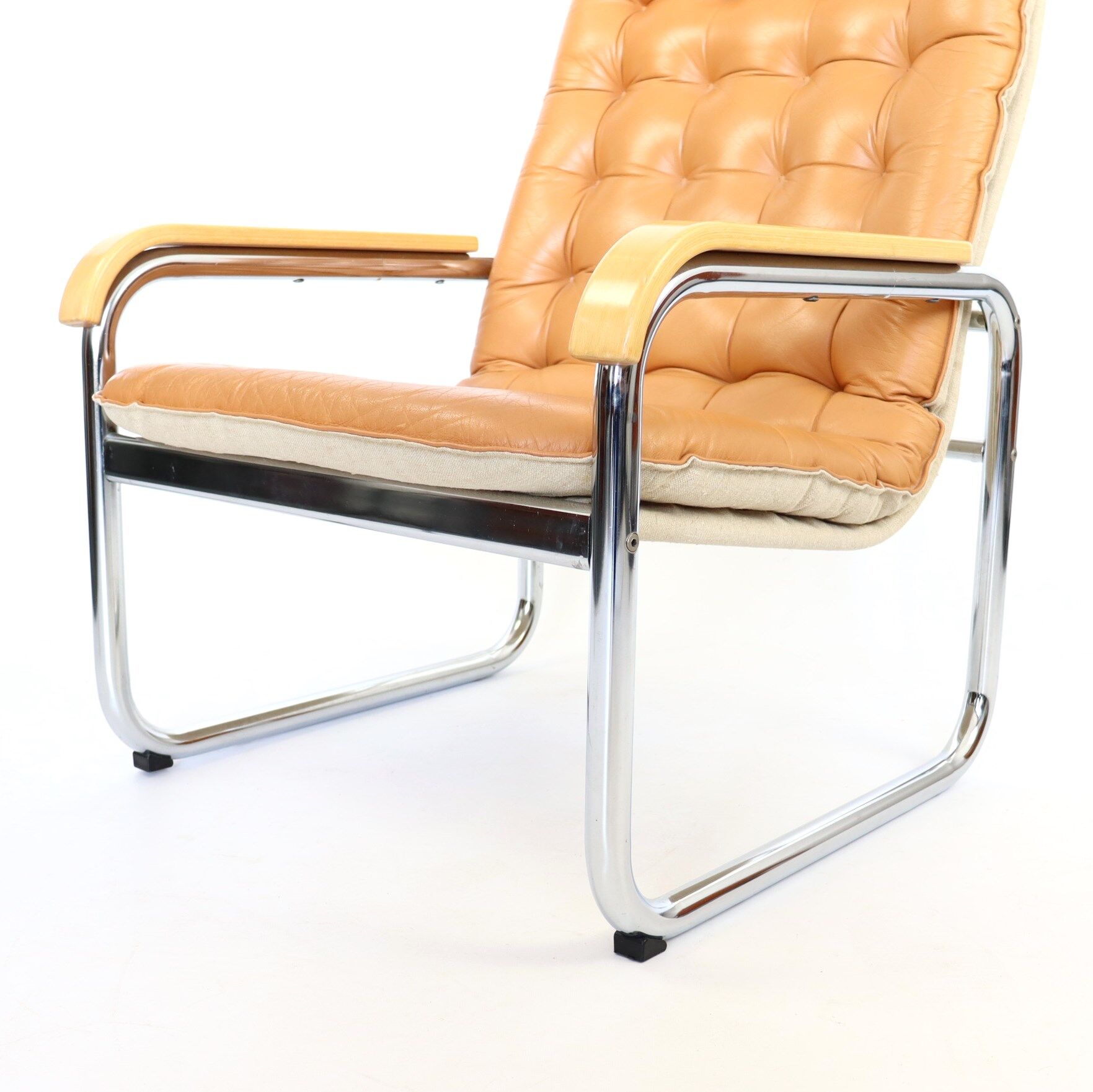 Leather and chrome armchair 70s