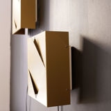 Golden wall light Raak