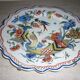 Decorative ceramic bird and cornucopia plate