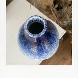 Blue and white speckled vase