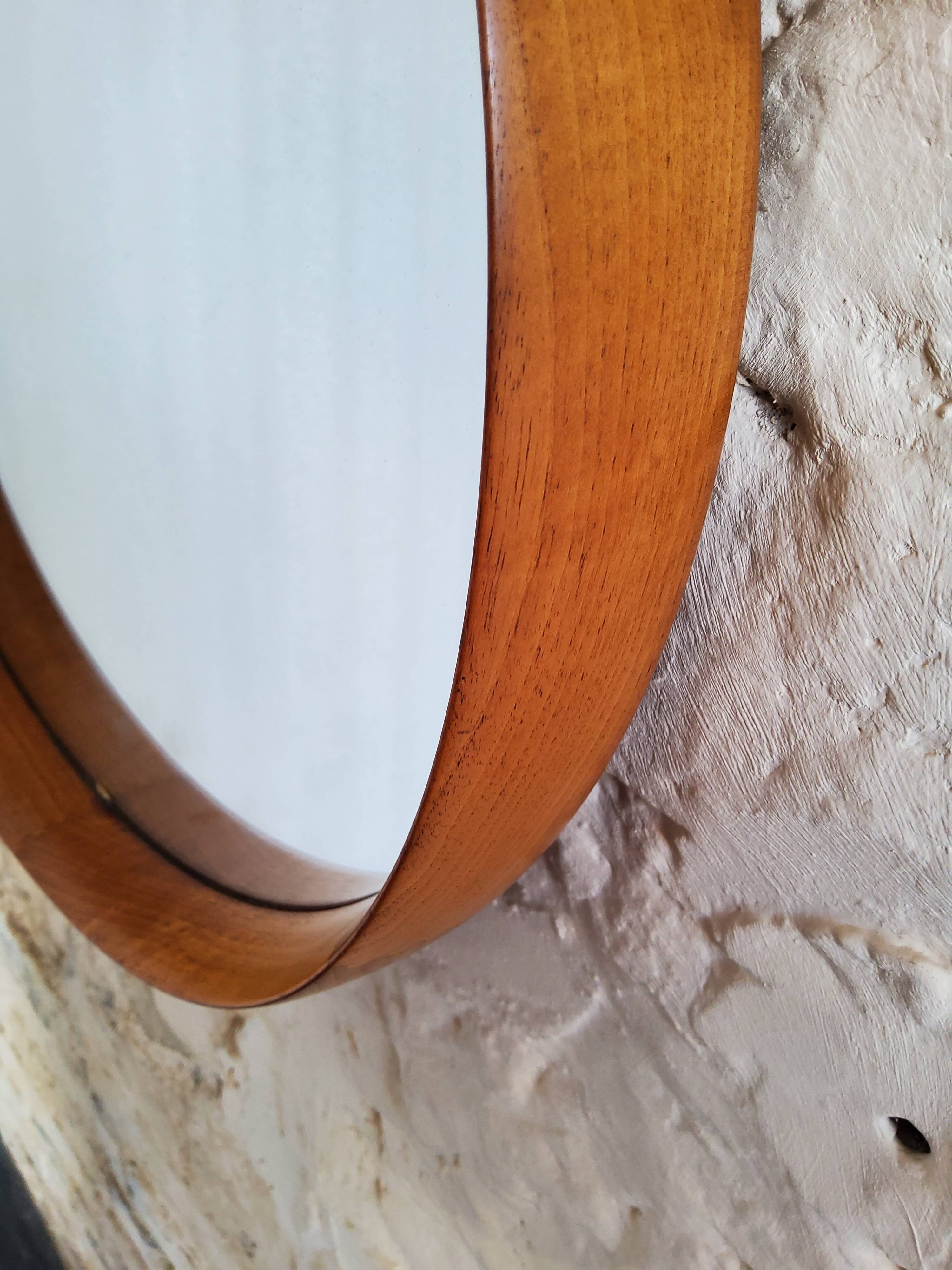 Round teak mirror by Uno and Osten Kristiansson for Luxus Vittsjö, Sweden.