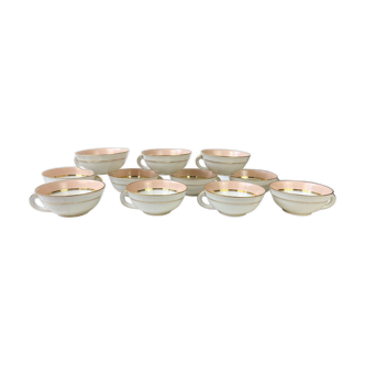 Vintage tea cups in golden pink porcelain limoges