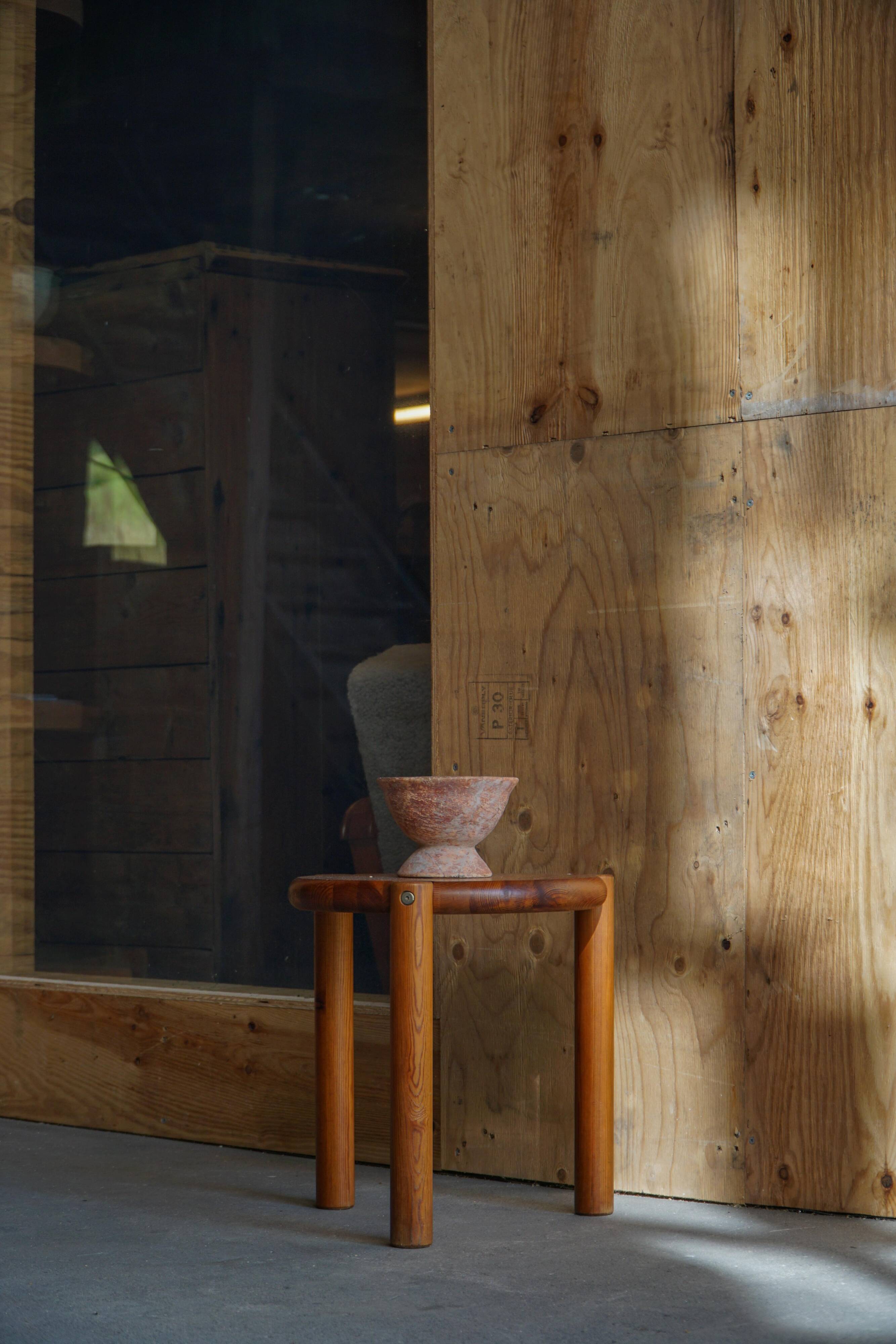 Modern Scandinavian tripod stool from the 20th century with a circular seat, 1970s.