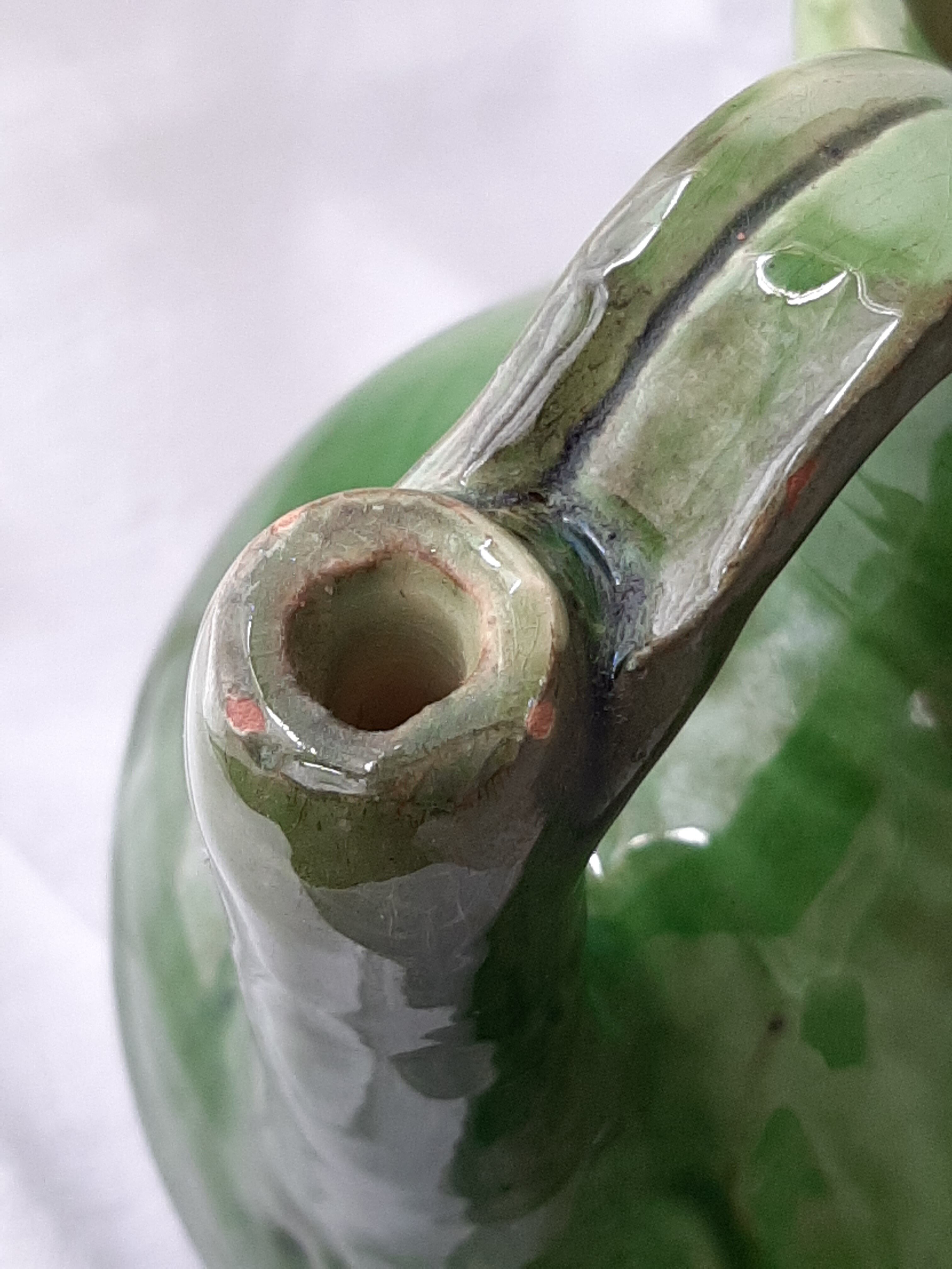 Old glazed terracotta pitcher