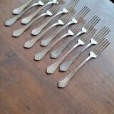 Set of silver metal forks
