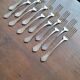 Set of silver metal forks