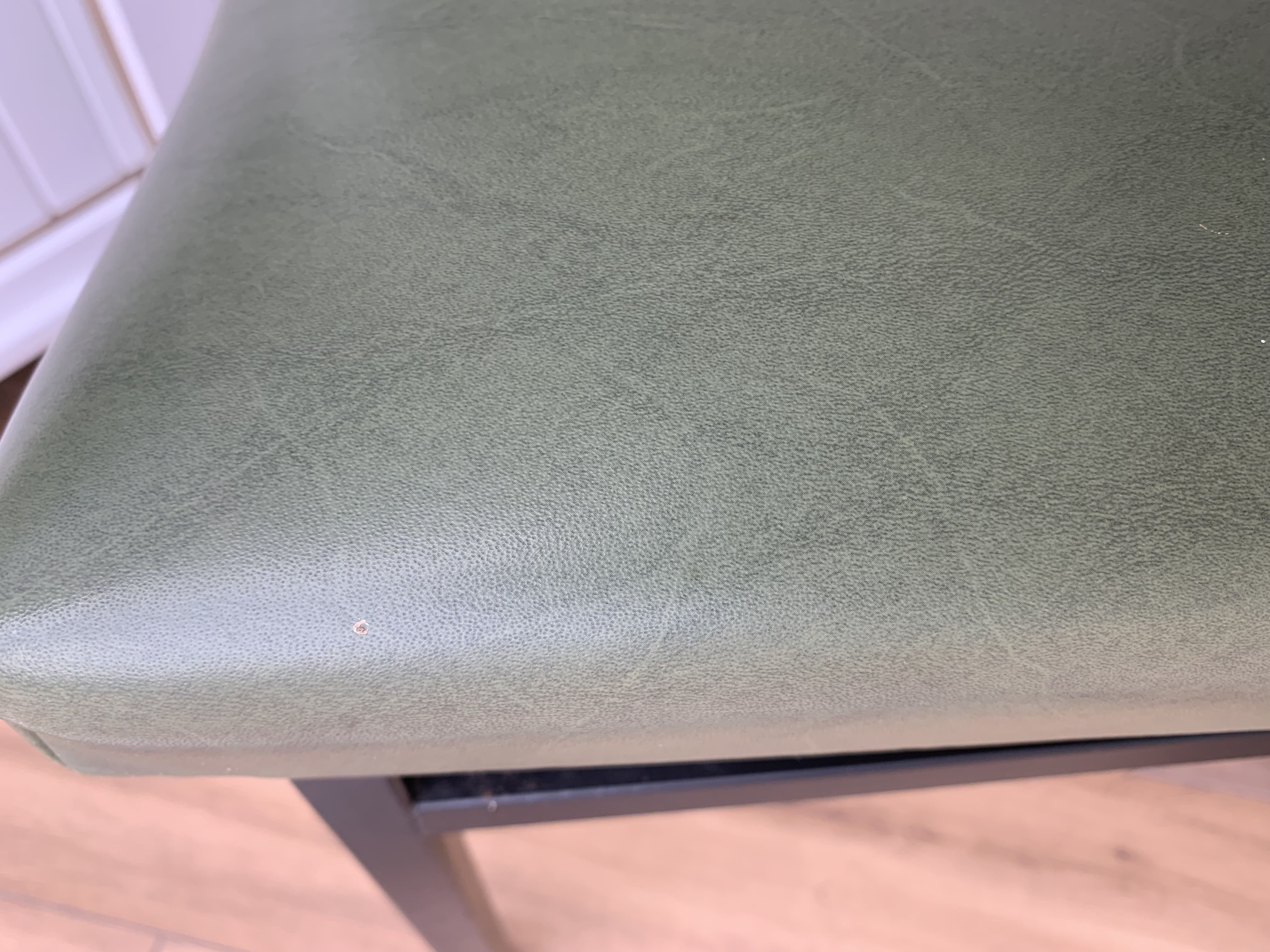 green and metal skai chair