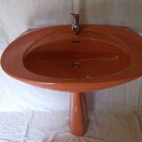 Vintage sink and its orange shelf