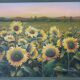 Old oil painting depicting a landscape of sunflowers