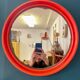Round orange mirror Gilac for Prisunic