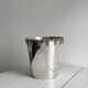Antique champagne bucket in shiny silver metal
