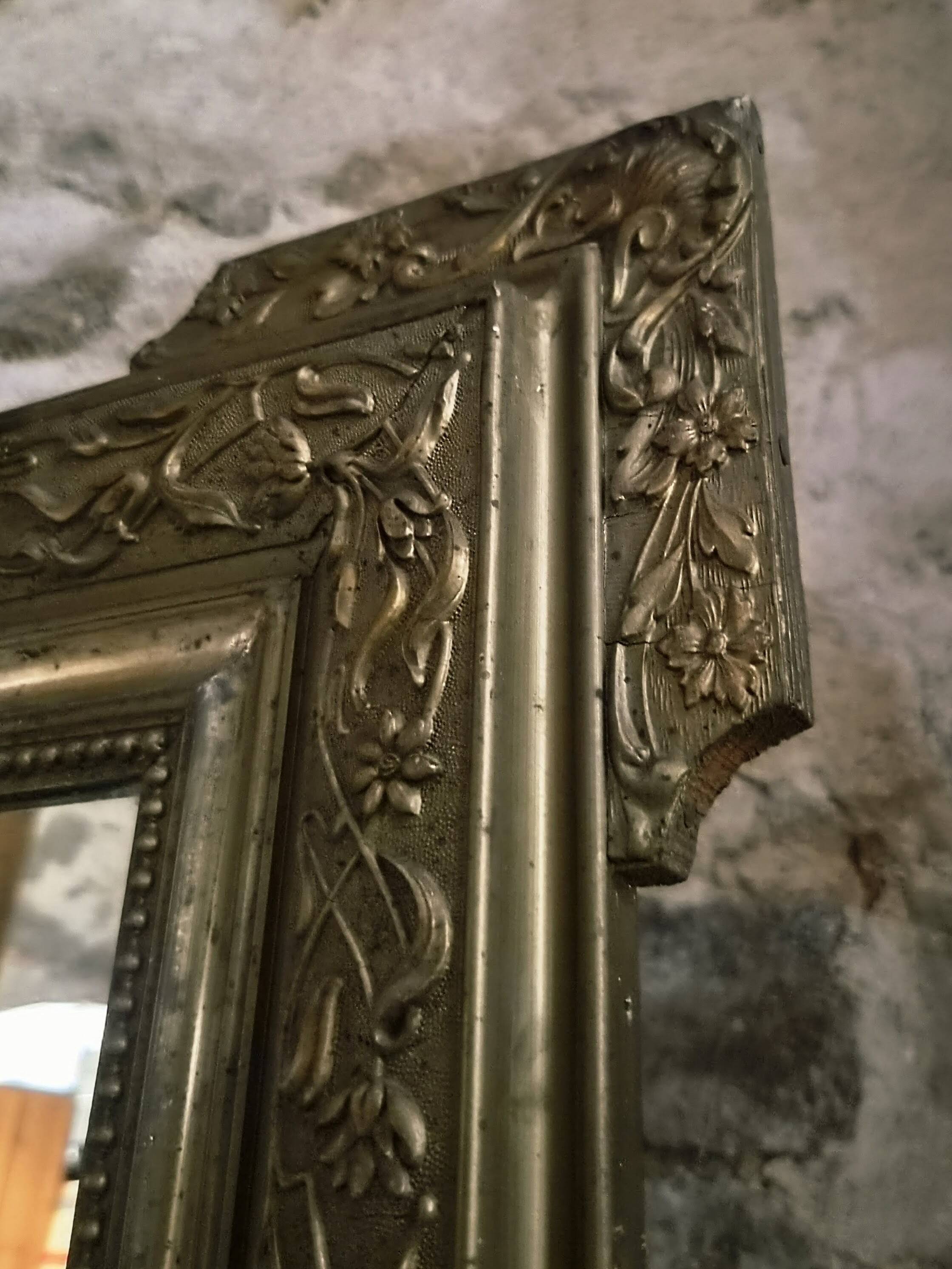 Large French mirror in Napoléon III style with a composition frame, circa 1880–1900.