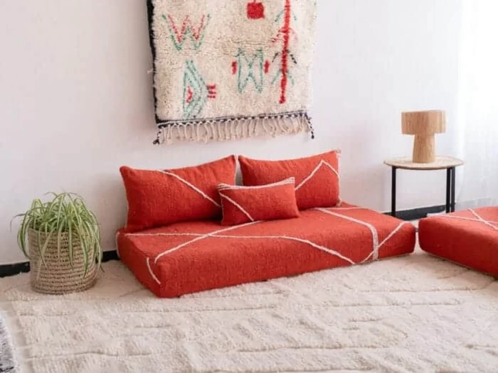 Handmade Moroccan floor cushion in orange cotton.