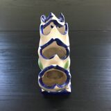 Fan vase with floral decoration