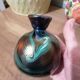 Iridescent marbled vase in the style of Loetz.