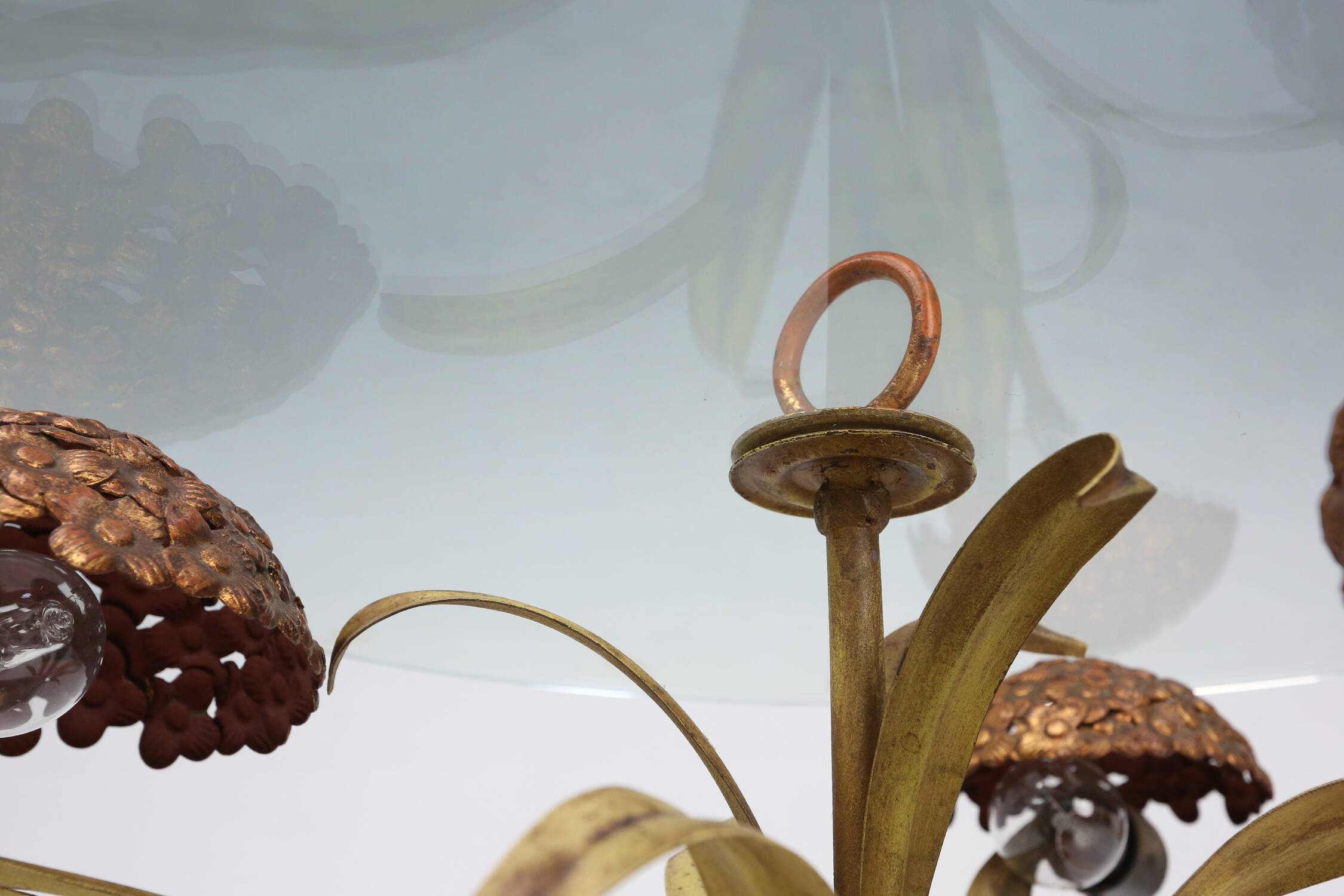 French Hollywood Regency style coffee table with lightning in brass flowers, 1950