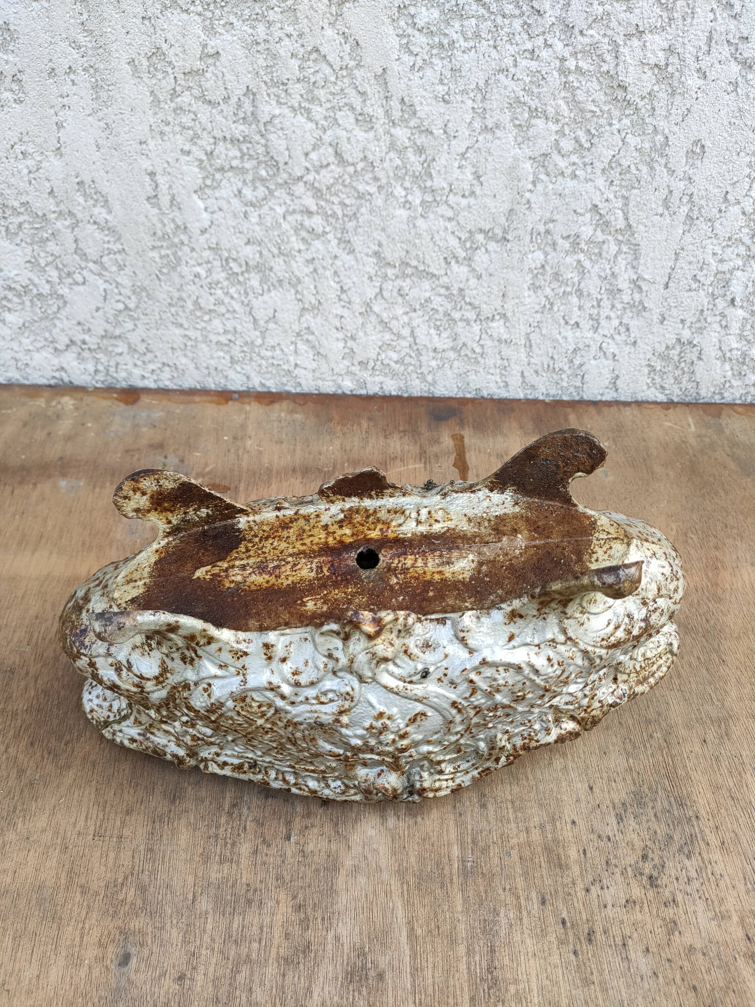 old cast iron planter