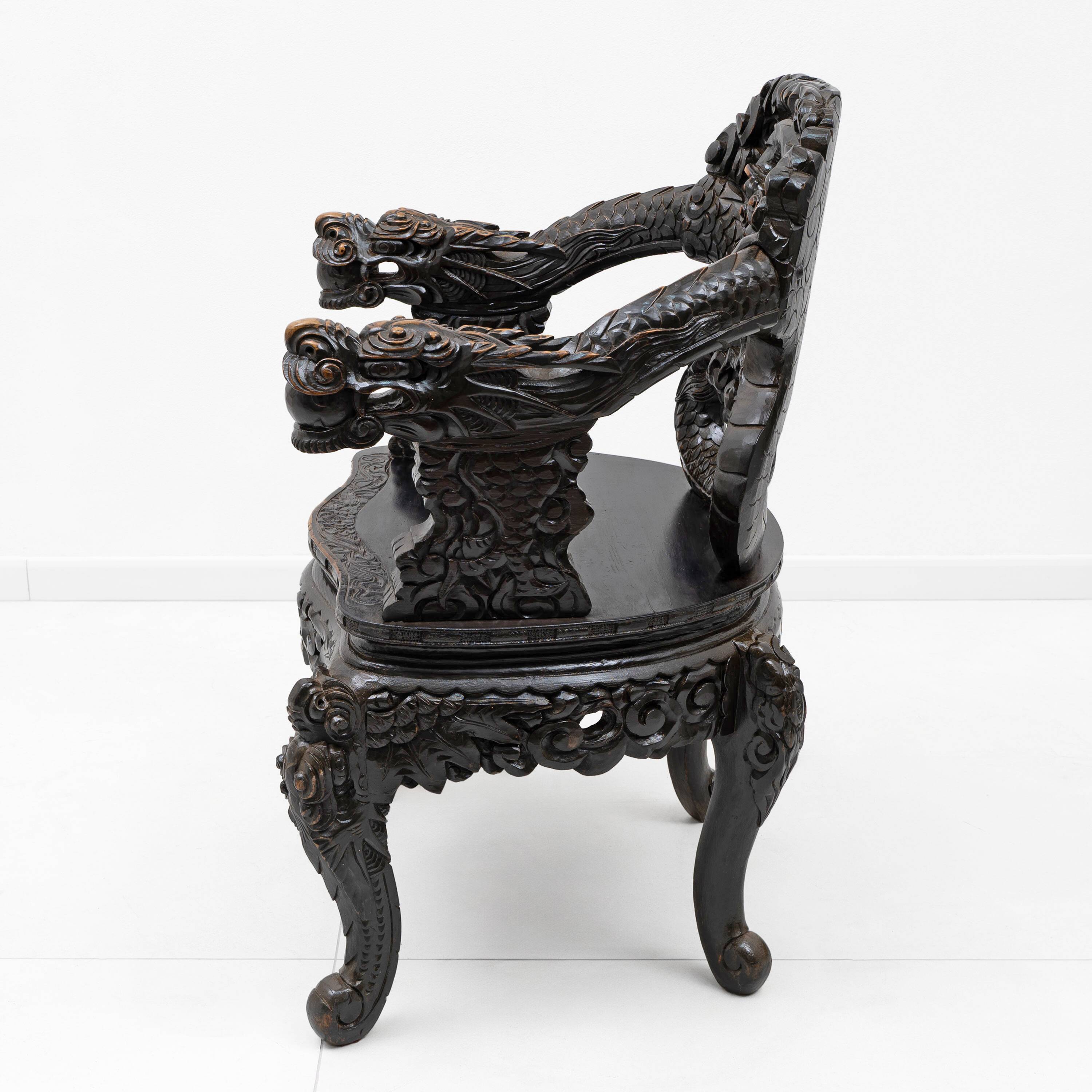 Pair of Chinese Qing Dynasty Carved Dragon Armchairs,Ebonized Hardwood,19th