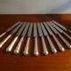 12 antique Art Deco knives silver metal and molten steel blades