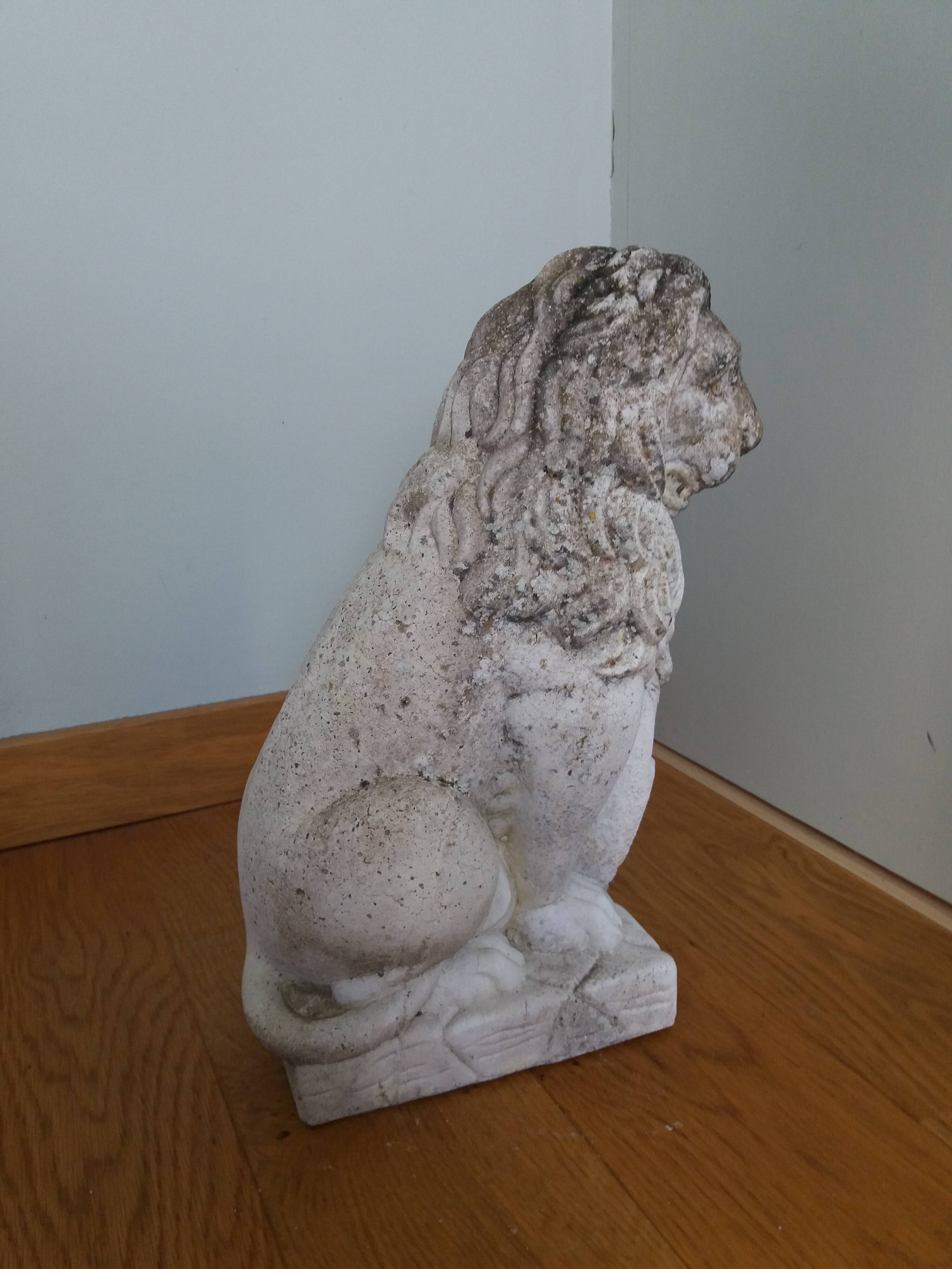 Lion garden statue in reconstituted stone