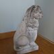 Lion garden statue in reconstituted stone