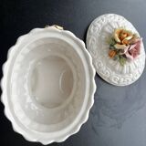 Capodimonte-style porcelain lidded sugar bowl with floral relief