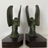 Pair of eagle bookends in green patina regula with rosewood base