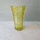 Large Czech vase in pressed glass, tinted yellow with geometric shapes.