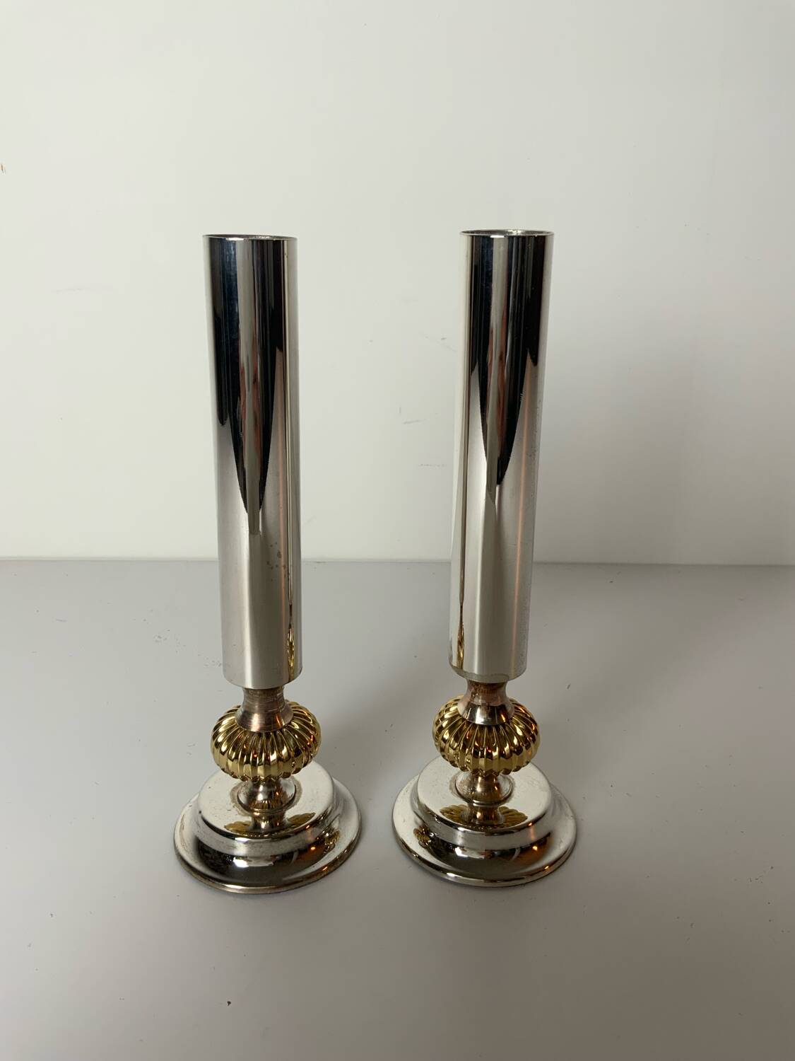 Pair of metal candlesticks