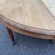 Round extendable dining table Napoleon III renovated in 19th-century oak.