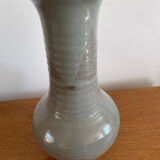 Glazed stoneware based, signed.