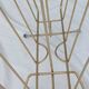 Vintage magazine rack in golden brass