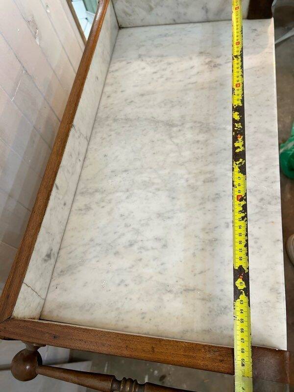 Beautiful antique furniture in marble and wood.