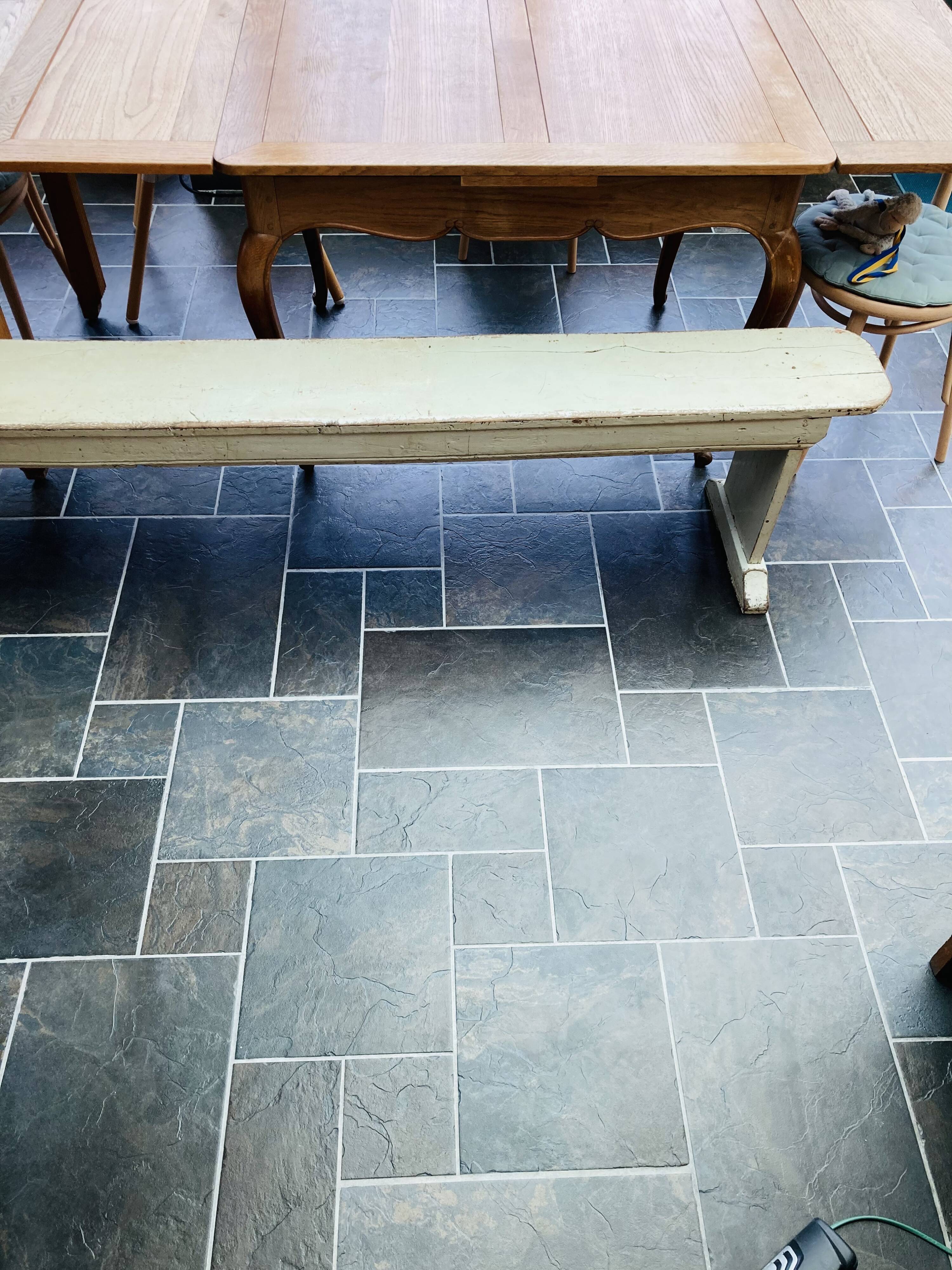 Old wooden bench painted in light green