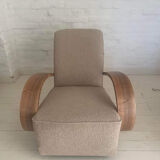 Art deco armchair in walnut and curly fabric