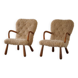 Pair of clam chairs in lambswool, Skive Møbelfabrik, Denmark, 1950s
