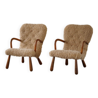Pair of clam chairs in lambswool, Skive Møbelfabrik, Denmark, 1950s