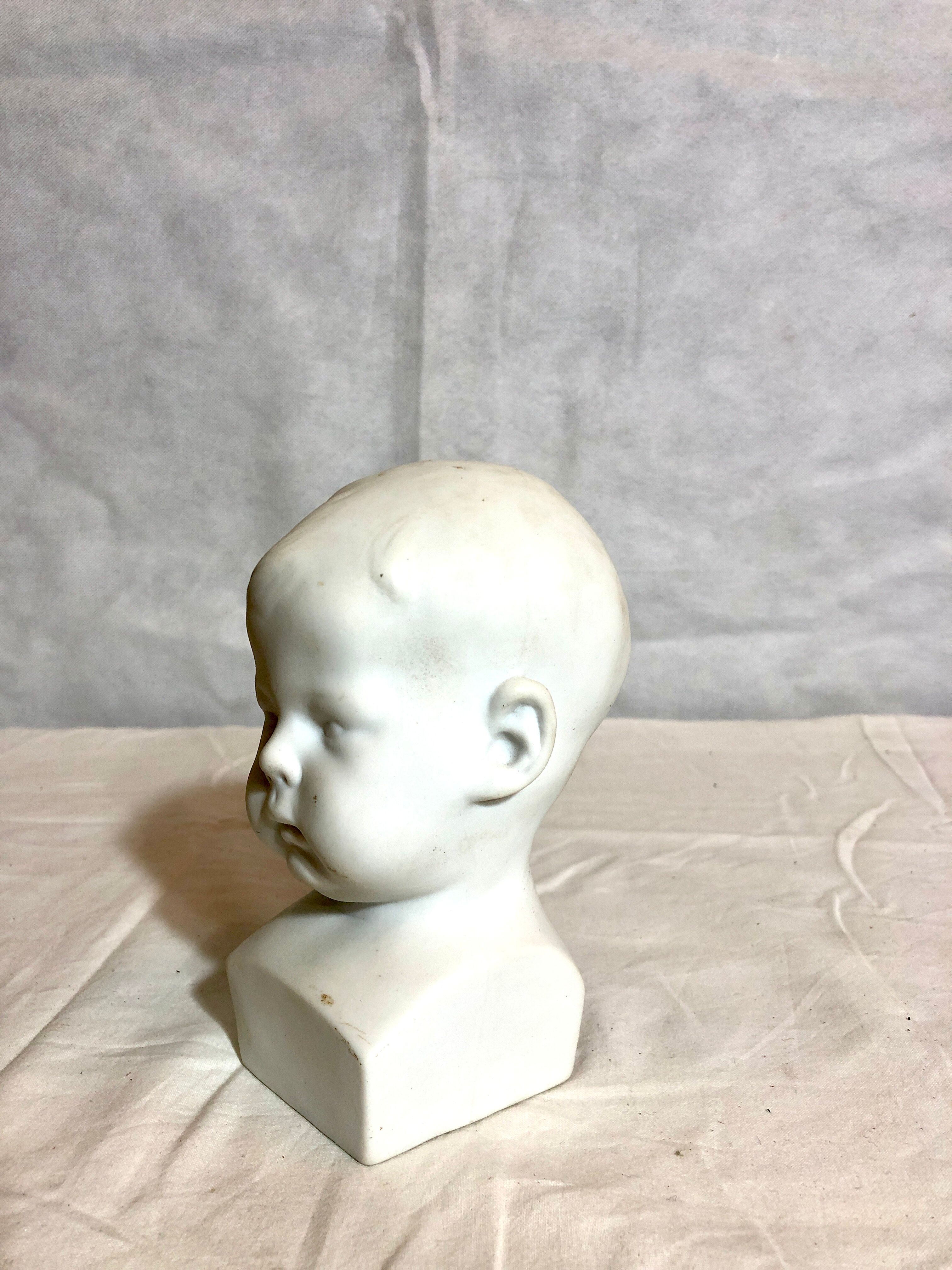 Tête d’enfant en biscuit, XXe siècle