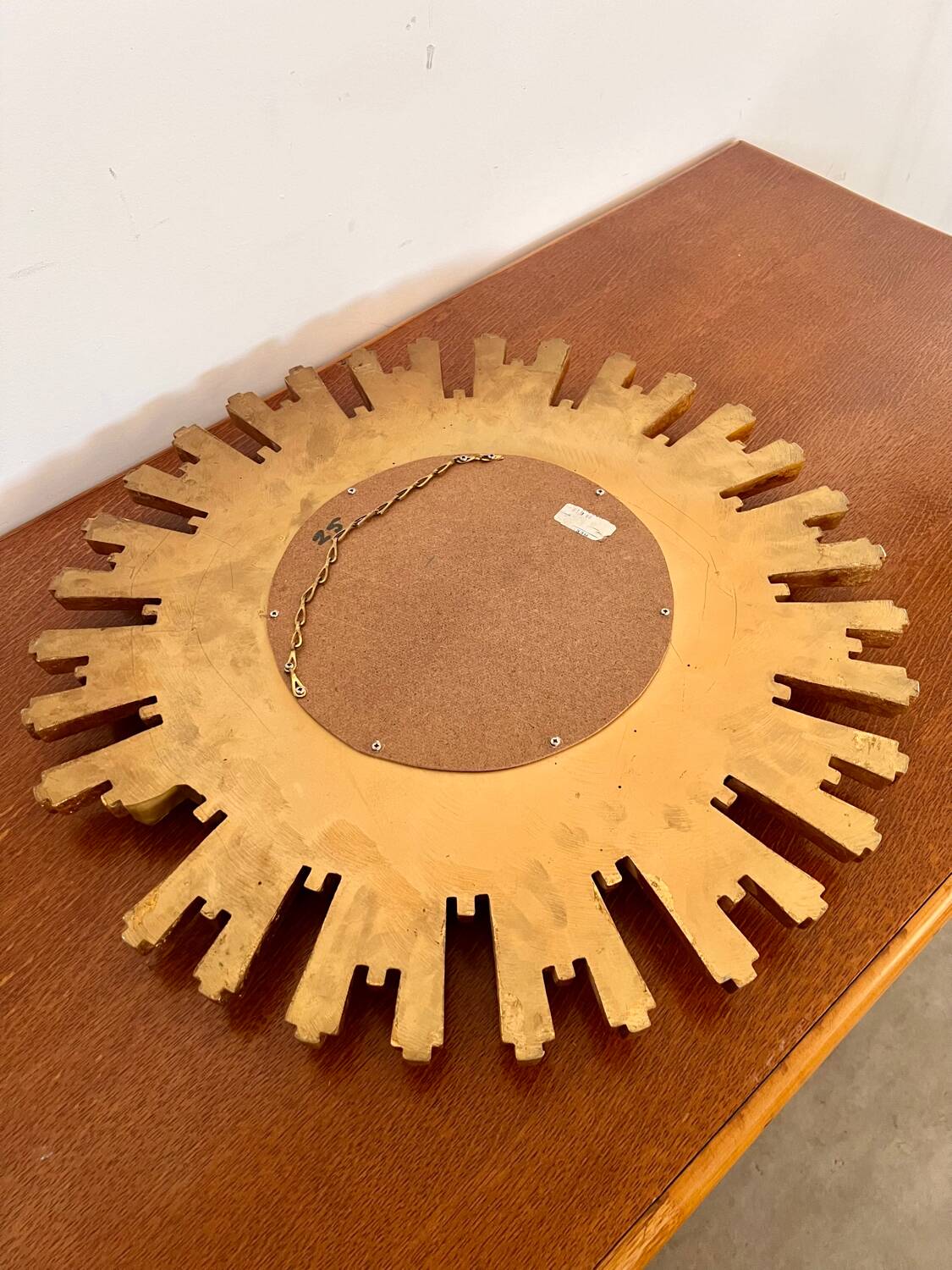 Old large golden sun mirror with rounded witch's eye in vintage resin from the 70s