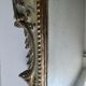 Mirror with cherub head in gilded wood, Venetian baroque style