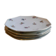 Série de 4 assiettes dessert en porcelaine de Limoges