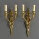 According to Jean-Charles Delafosse (1734-1791). Pair of bronze wall sconces.
