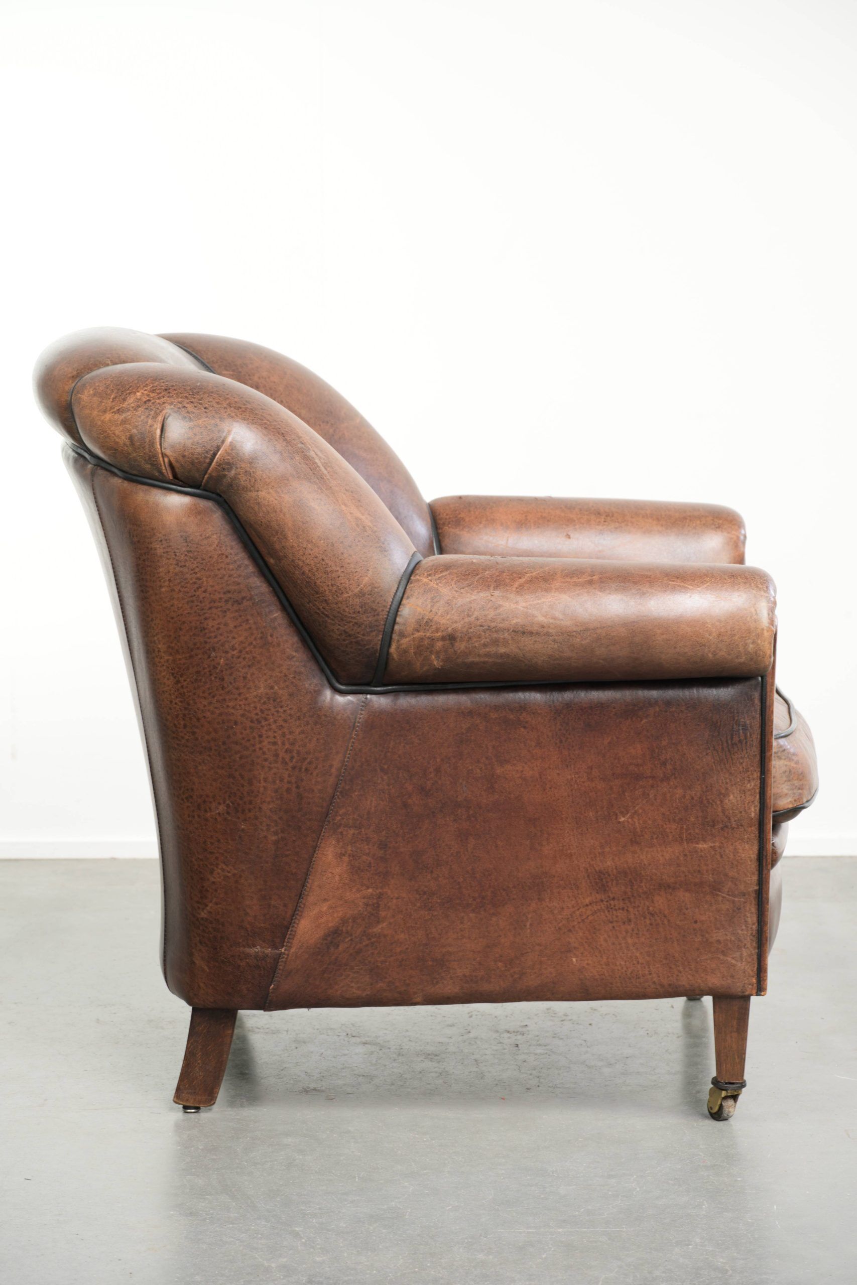 Vintage sheepskin armchair with a unique design and timeless appearance