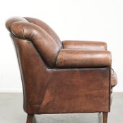 Vintage sheepskin armchair with a unique design and timeless appearance