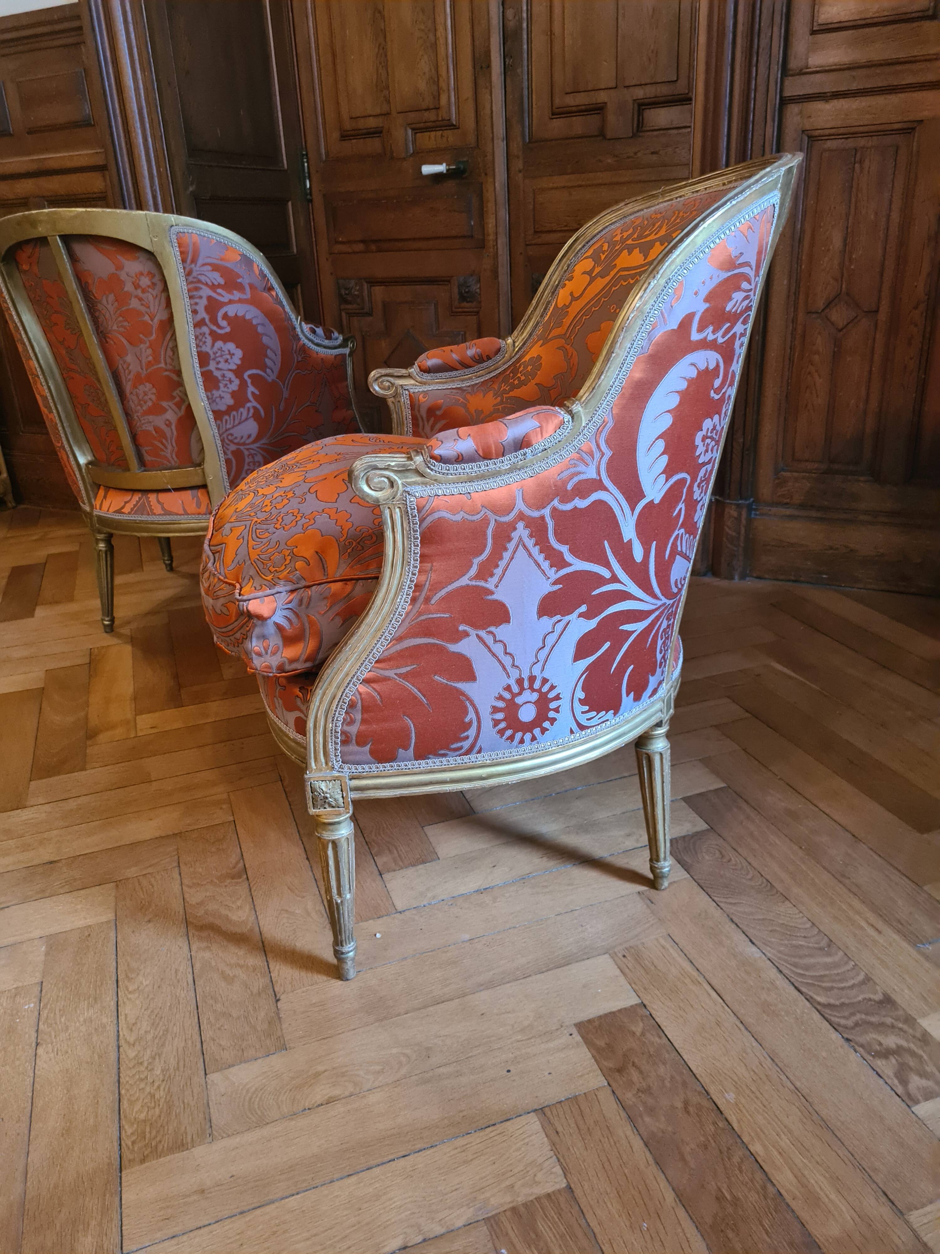 Pair of Louis XVI period shepherdesses, in gilded wood