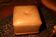 Cube pouf in light brown leather
