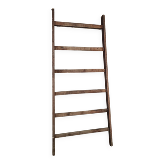 Old wide wooden ladder for decoration